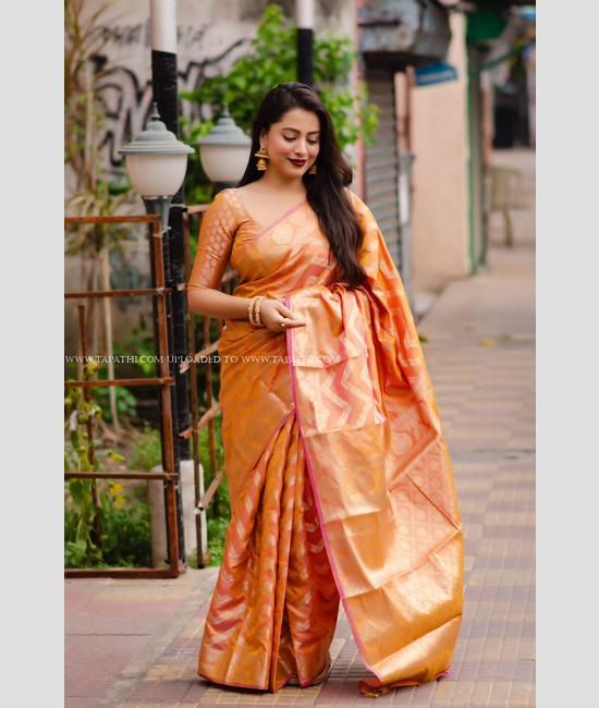 Peach color banarasi silk saree with woven design